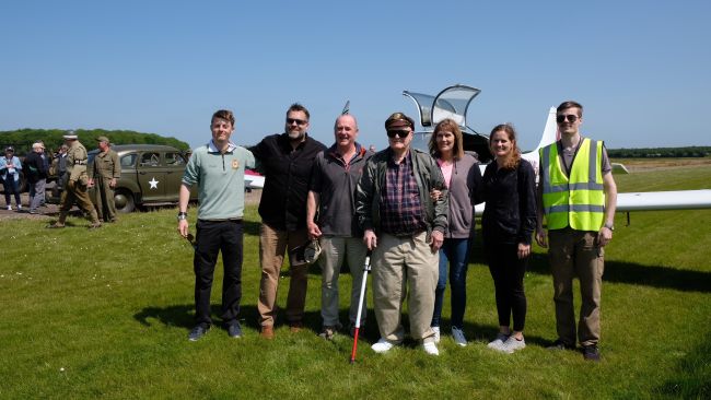 Ray Hobbs and his family with local pilot Rod Wheeler.